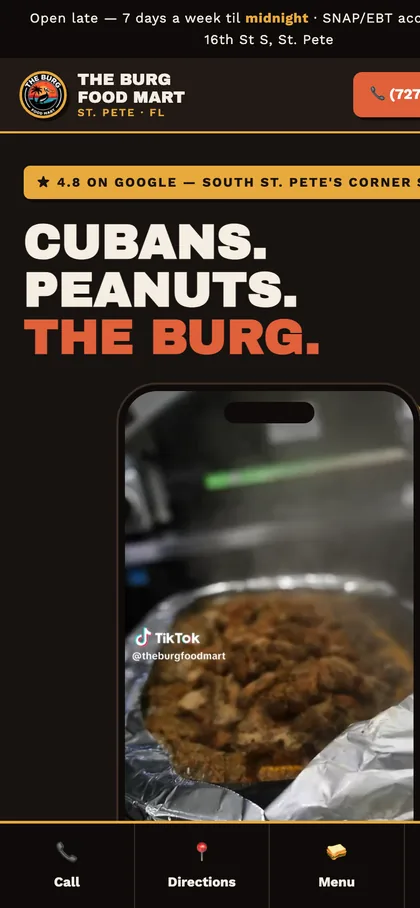The Burg Food Mart — on a phone